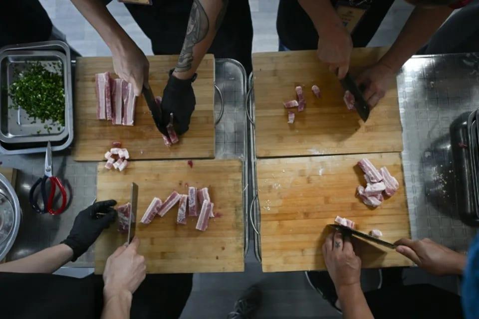 Budding chefs cook up new career at China's BBQ academy | Business