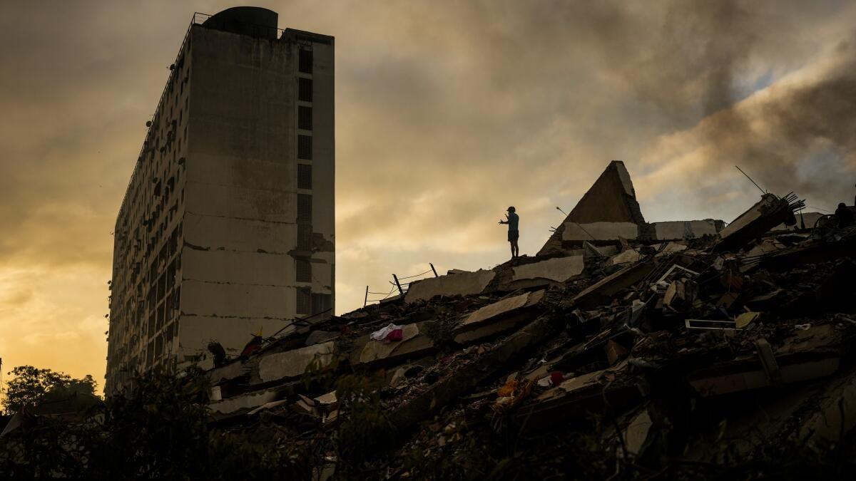 An 'angel' in darkness after Venezuela's deadly quakes | International