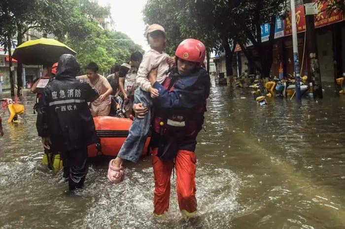 Rescuers search for missing in China storms after 100,000 evacuated | Sports
