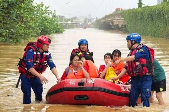 Rescuers search for survivors of China storms as super typhoon nears | International