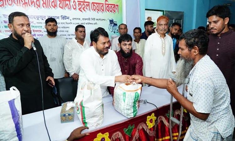 RCC administrator distributes food aid, wheelchairs | District