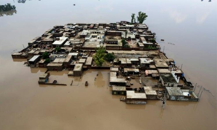 Flooding forces residents to flee homes by boat in Pakistan | International