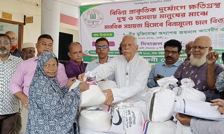 Rice distributed among disaster-affected families in Feni | District