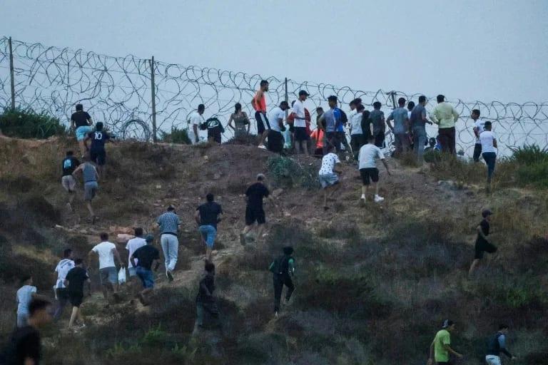 EU grapples with migrant crisis in Spain's N. Africa enclave | International