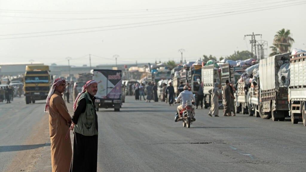 Return of displaced Syrian Kurds to hometown suspended after violence | International