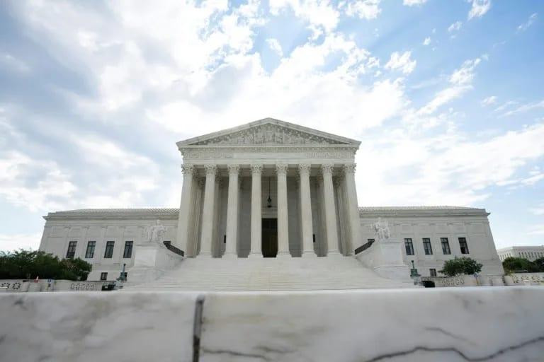 Top court upholds Trump bid to curb mail-in ballots for now | International