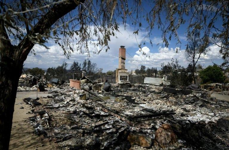 Tens of thousands flee fire near US city of Reno | International