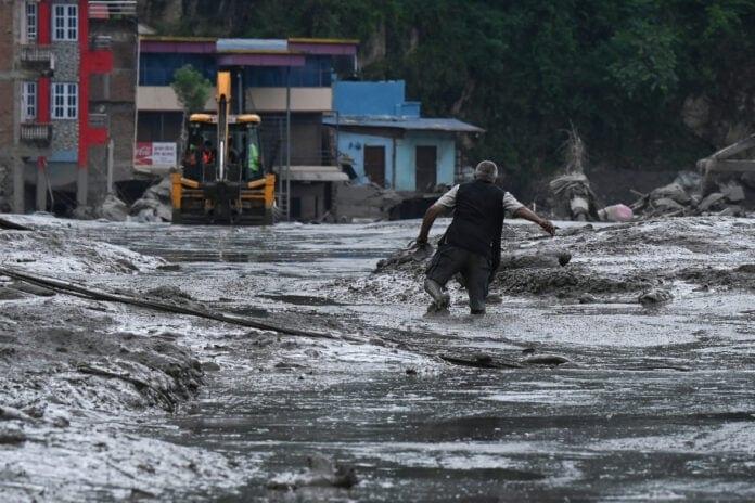 Search for missing after Nepal-Tibet floods kills at least 160 | International