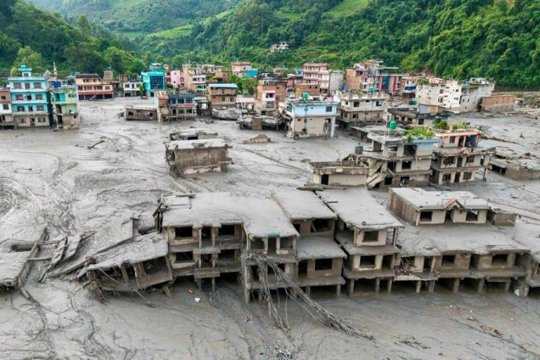 Desperate families search for missing after Nepal floods | International