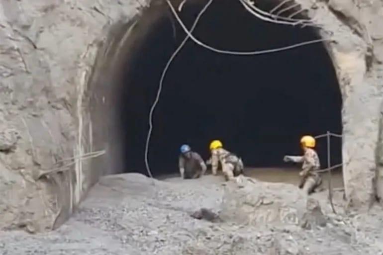 Nepal recovers bodies but presses on for trapped tunnel workers | International