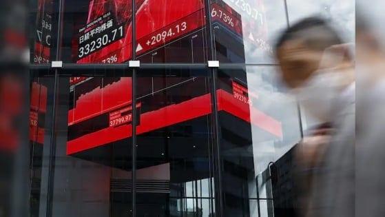 Tech firms rally on mixed day for Asian markets, with eyes on US inflation | Business