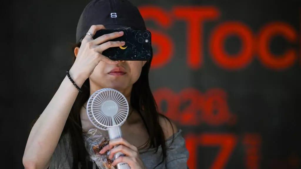 Japan cities 'cruelly hot' for first time | International