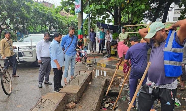 RCC administrator inspects drain cleaning activities | District