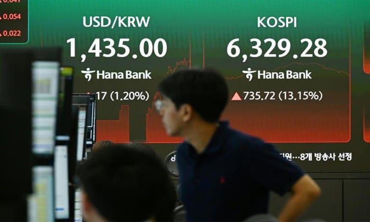 Asian stocks mostly down with tech firms back under pressure | Business