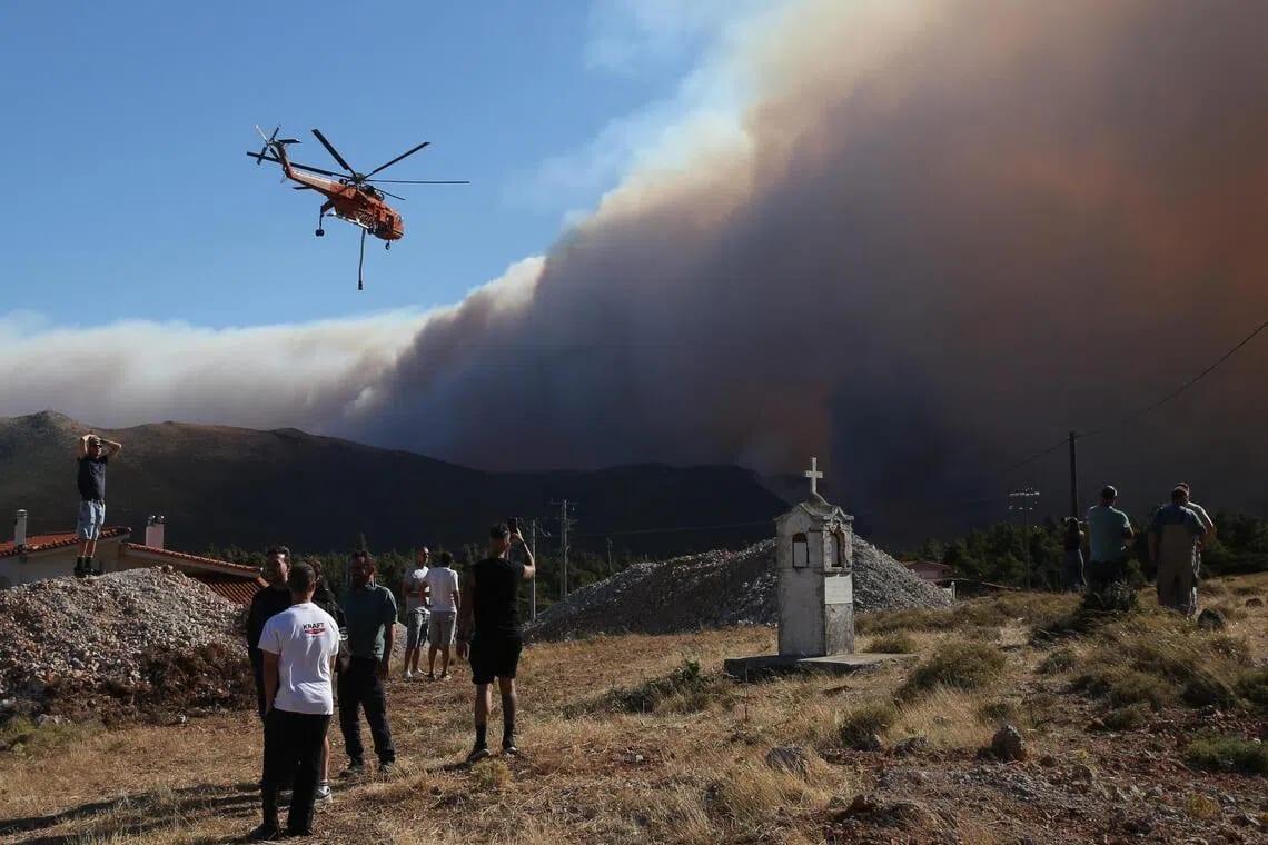 Greek mayor among three charged over wildfire near Athens | International