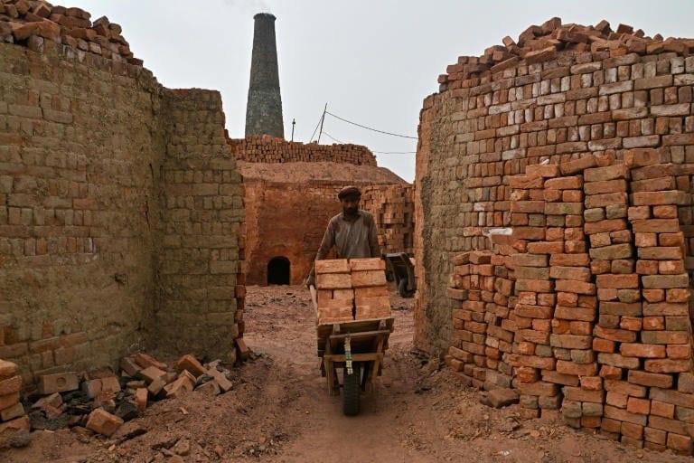 Pakistan brickmakers scorched by sun above and fire below | International