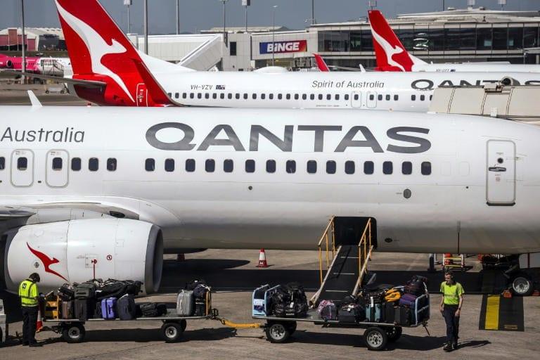 Qantas says profits slump as fuel costs surge | Business